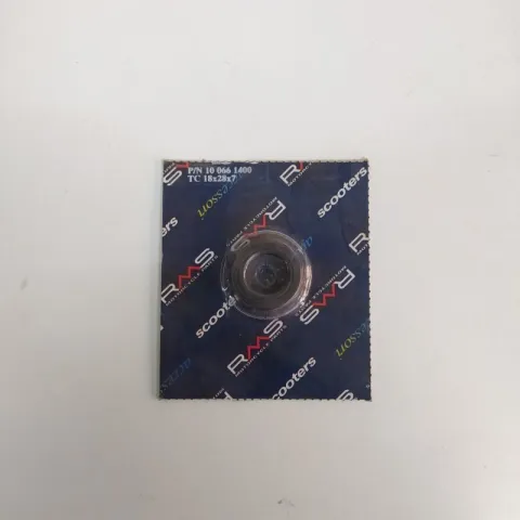PARAOLIO 18X28X7 RMS PIAGGIO ( LATO VOLANO ) cod.100661400
